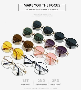 Detailed display of round metal sunglasses in various vintage colors and stylish frames