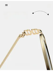 Macro detail of high-quality golden metal hinge with intricate M-link design on round sunglasses