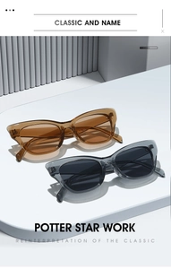 Detail view of vintage cat eye sunglasses in amber and smoke grey resin frames
