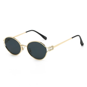 Retro round metal sunglasses with gold frames and dark lenses in 45-degree view