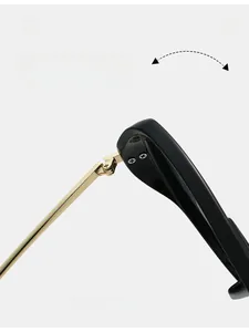 Detail of durable gold metal hinge connecting to thick black glossy temples for sunglasses