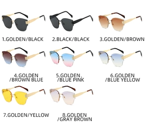 Detail view of rimless cat-eye sunglasses in eight various gradient lens colors and metal temples