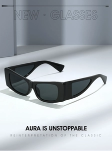 Detail of black rectangular sunglasses featuring a unique geometric hollow temple design