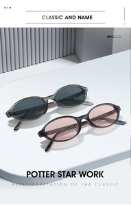 Detail of retro oval frame sunglasses with transparent finish and heart temple design