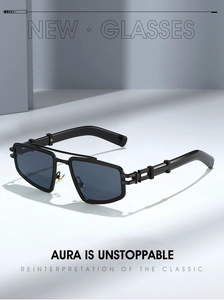 Detail of high-quality black metal frame sunglasses with industrial hollow temples