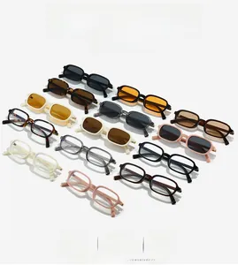 Selection of trendy rectangular sunglasses in various colors with sleek gold metal hinges