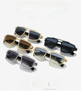 Detailed side view of punk sunglasses showing intricate hollow-carved metal frames