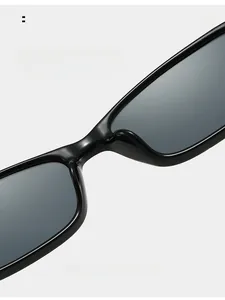 Detail of ergonomic integrated nose pads on black square sunglasses for comfort