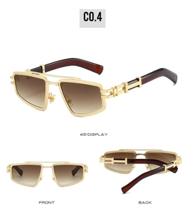 Detail view of vintage gold semi-rimless sunglasses with brown gradient lenses and hinges