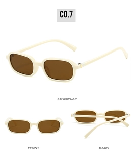 Three perspectives of retro oval sunglasses with cream frame and brown tinted lenses