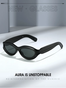 Detail view of bold black oval frames and dark grey lenses of retro sunglasses