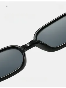 Close-up of integrated nose pads on black narrow-frame sunglasses for comfort