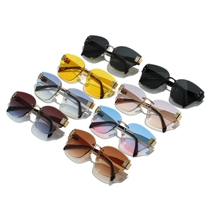 Collection of eight frameless oversized sunglasses with various colored gradient lenses