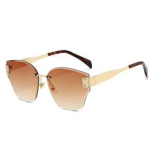 Fashion rimless sunglasses with brown gradient lenses and golden metal temples