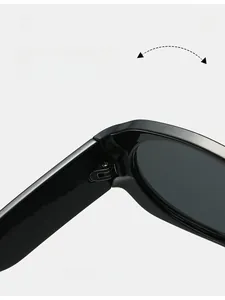 Close-up of durable metal hinge on black rectangular sunglasses showing craft details