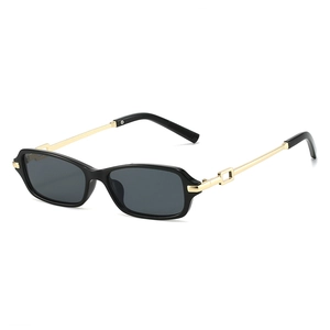 Retro rectangle sunglasses with black thick frame and golden metal temples on white background