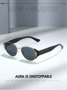 Detail of fashion cat-eye sunglasses with golden H-metal hardware and black wide temples