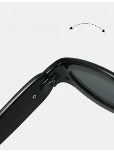 Detail shot of durable metal hinge on premium polished black retro sunglasses
