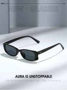 Close-up of black rectangular sunglasses with polished frames and gray lenses