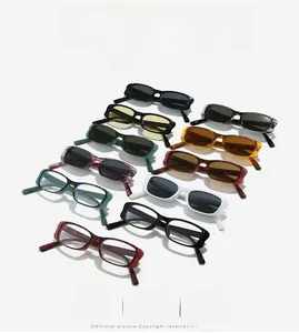 Flat lay of colorful vintage rectangle sunglasses with various stylish frames in a row