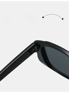 Detail shot of durable texture hinge on trendy black square retro sunglasses