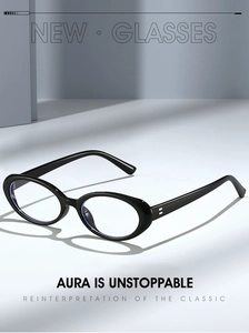 Detail of black oval frame glasses featuring silver hinge rivets and premium glossy finish