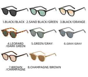 Macro display of eight vintage round-frame sunglasses color variants with metal rivets
