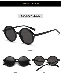 Vues multiples de lunettes de soleil ovales noires vintage avec des accents argentés