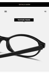 Close-up of durable metal hinge on vintage oval glasses with textured black frame