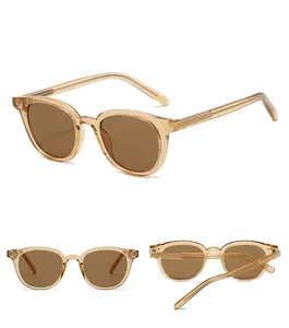 Multi-angle view of vintage amber sunglasses with brown lenses and transparent frame