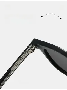 Macro view of durable silver metal hinges and sleek black acetate frames for sunglasses
