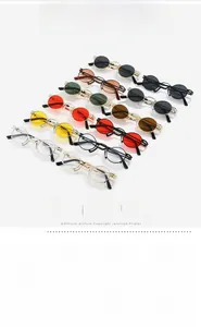 Multiple vintage round metal sunglasses in various colors showing UV400 protection