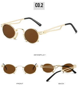 Detail view of round vintage sunglasses with gold metal frames and hollow geometric temples