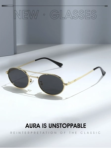 Close-up of vintage oval sunglasses with double bridge metal frame and dark gray lenses