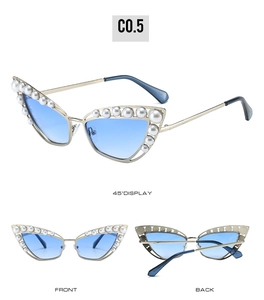 Cat eye sunglasses with pearls, gold metal frame and blue gradient lenses view
