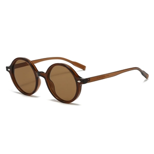 Lunettes de soleil ovales rétro champagne ambre avec rivets argentés et verres bruns