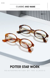 Detail of oval tortoiseshell frames with gold metal temples and geometric cutouts