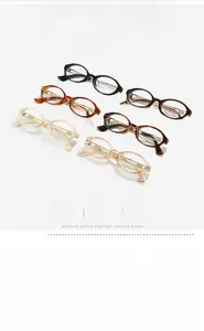 Detail of trendy oval anti-blue light glasses frames in six different colors on white surface