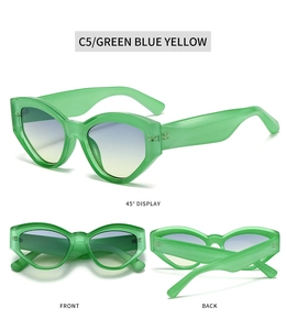 Multi-angle view of green translucent cat eye sunglasses with blue-yellow gradient lenses