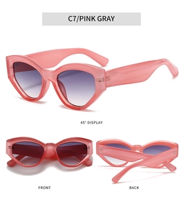 Detail view of pink translucent cat-eye sunglasses with gradient grey lenses from three angles