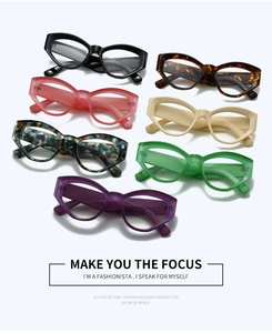 Top view of seven colorful cat eye and polygonal blue light blocking glasses frames