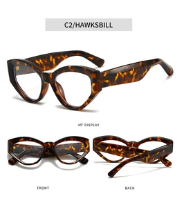 Detailed three-way view of hawksbill cat-eye glasses frames with gold rivet accents