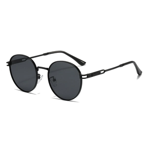 Lunettes de soleil ovales en métal avec verres noirs et monture alliage légère