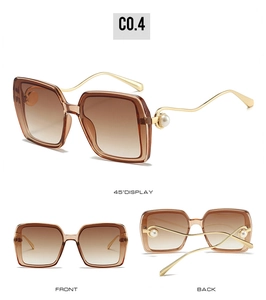 Détails de lunettes de soleil carrées rétro avec monture dorée et ornements en perles