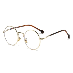 Classic round gold metal eyeglasses frame with tortoiseshell temples for women