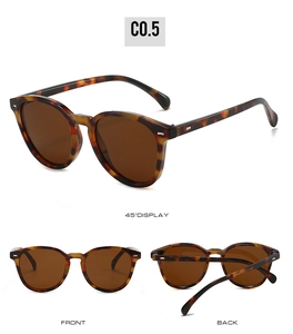 Three perspectives of retro oval tortoise shell sunglasses with dark brown lenses