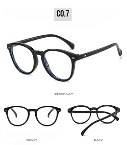 Multiple views of black oval frame sunglasses with silver rice nail accents and blue lenses