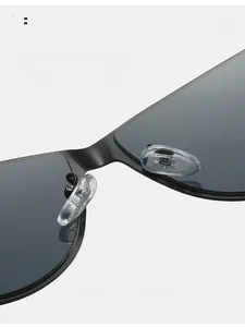 Macro shot of flexible silicone nose pads on black cat-eye metal sunglasses for comfort