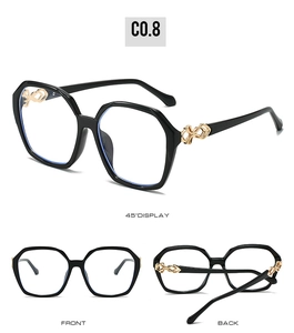 Detailed views of square oversized black sunglasses with golden woven metal temples