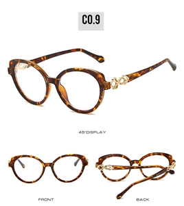Detail view of tortoiseshell oval sunglasses with decorative gold metal hinges from 45 angles